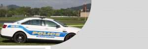 A close up of a police bloomsburg car
